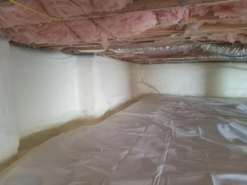 Crawl space encapsulation with closed-cell spray foam for Commercial Roof Restoration in North Kensington